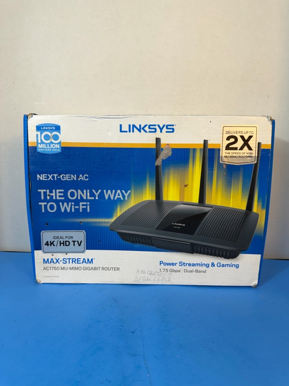 Linksys Black Wi‑Fi Router with Antennas on Branded Box